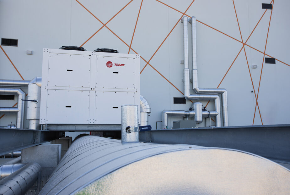 Exterior cooling equipment and piping at SuperNova